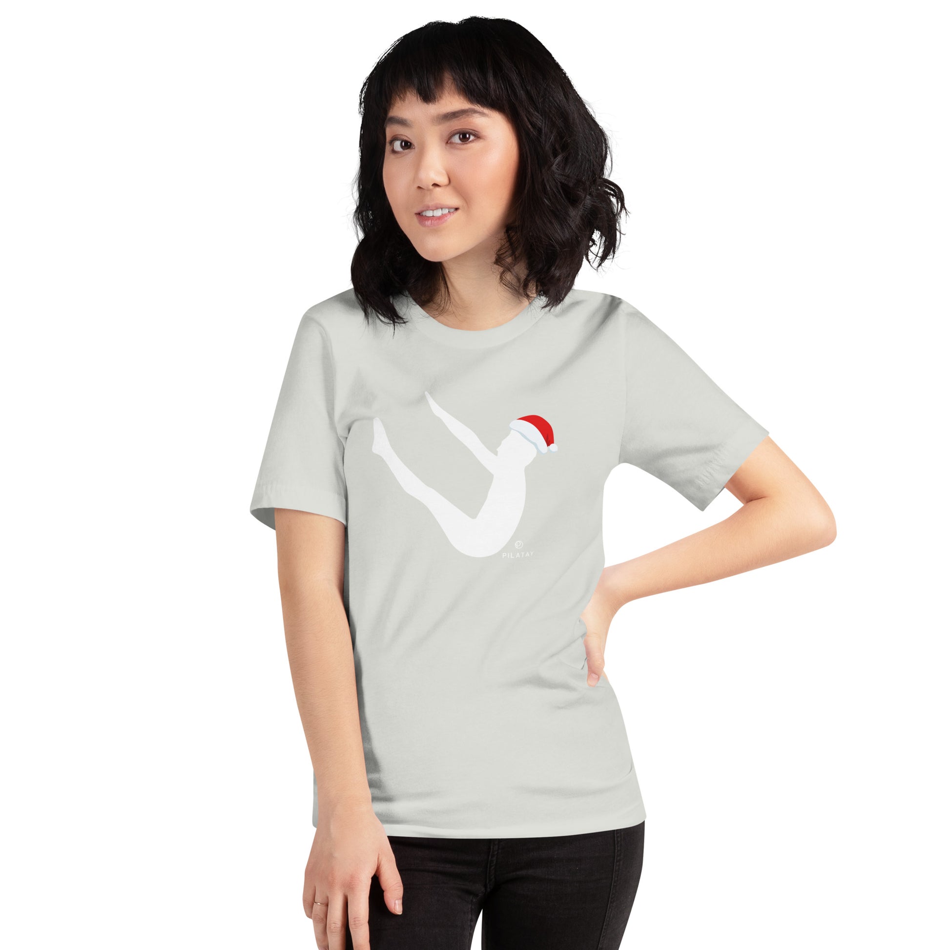 This shirt features a silhouette of Joseph Pilates doing the infamous Pilates Teaser exercise with a Santa hat on. The perfect holiday gift for Pilates teachers, clients, and lovers. Shop a selection of Pilates holiday cards, Pilates holiday shirts, and Pilates Christmas ornaments at Pilatay!