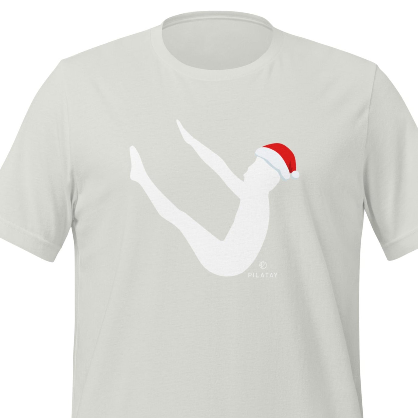 This shirt features a silhouette of Joseph Pilates doing the infamous Pilates Teaser exercise with a Santa hat on. The perfect holiday gift for Pilates teachers, clients, and lovers. Shop a selection of Pilates holiday cards, Pilates holiday shirts, and Pilates Christmas ornaments at Pilatay!