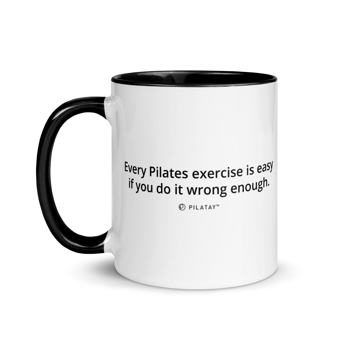 White mug with black interior and handle, featuring text on a white background