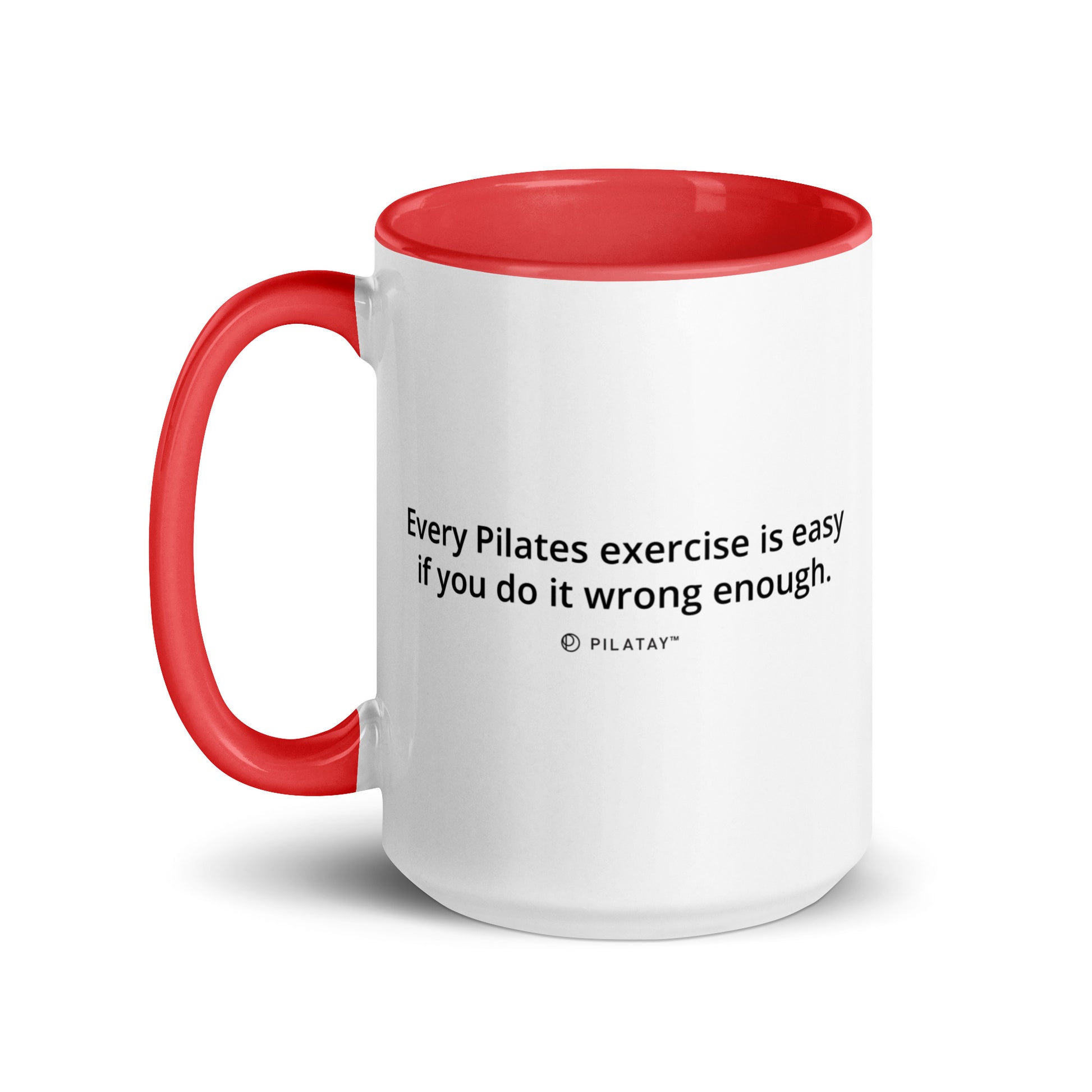 White mug with red handle and interior, featuring a humorous quote.